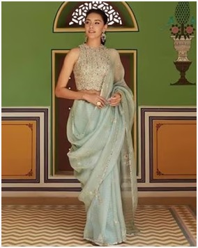 Light color saree with halter neck
